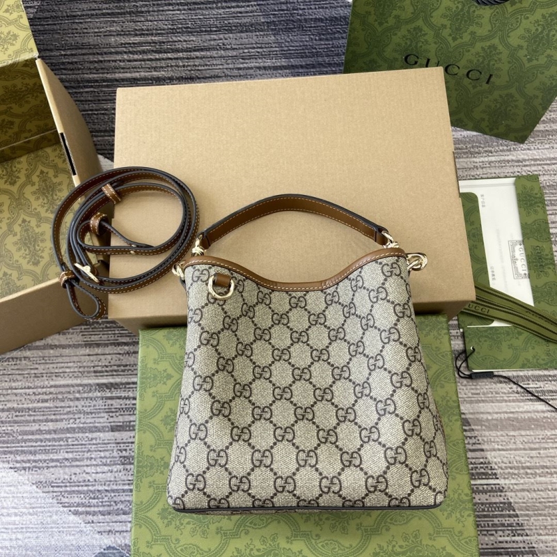 G*u*i top handle bags